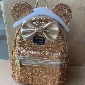 Disney yellow gold loungefly